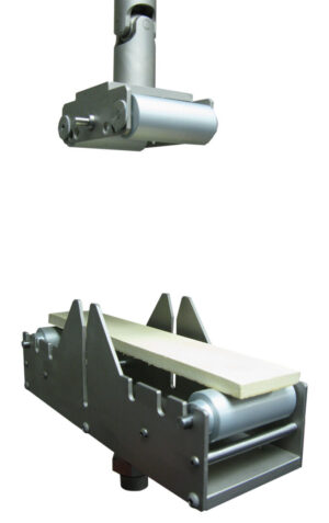 Adjustable span 4 point bend fixture for testing glass-fibre re-inforced concrete samples.